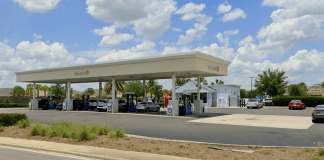 Walmart To Add Convenience Stores and Gas Stations To Locations In 34 States Walmart gas station with cars refueling.